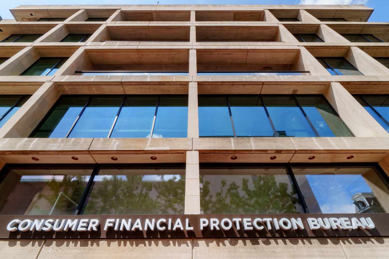 The entrance to the Consumer Financial Protection Bureau (CFPB) headquarters building is seen on August 18, 2024, in Washington, DC.