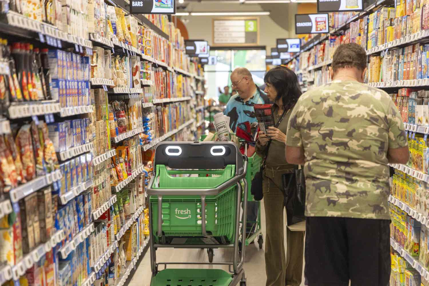 Shoppers check out the Amazon Fresh store during its grand opening on Oct. 24, 2024, in Plainview, New York.