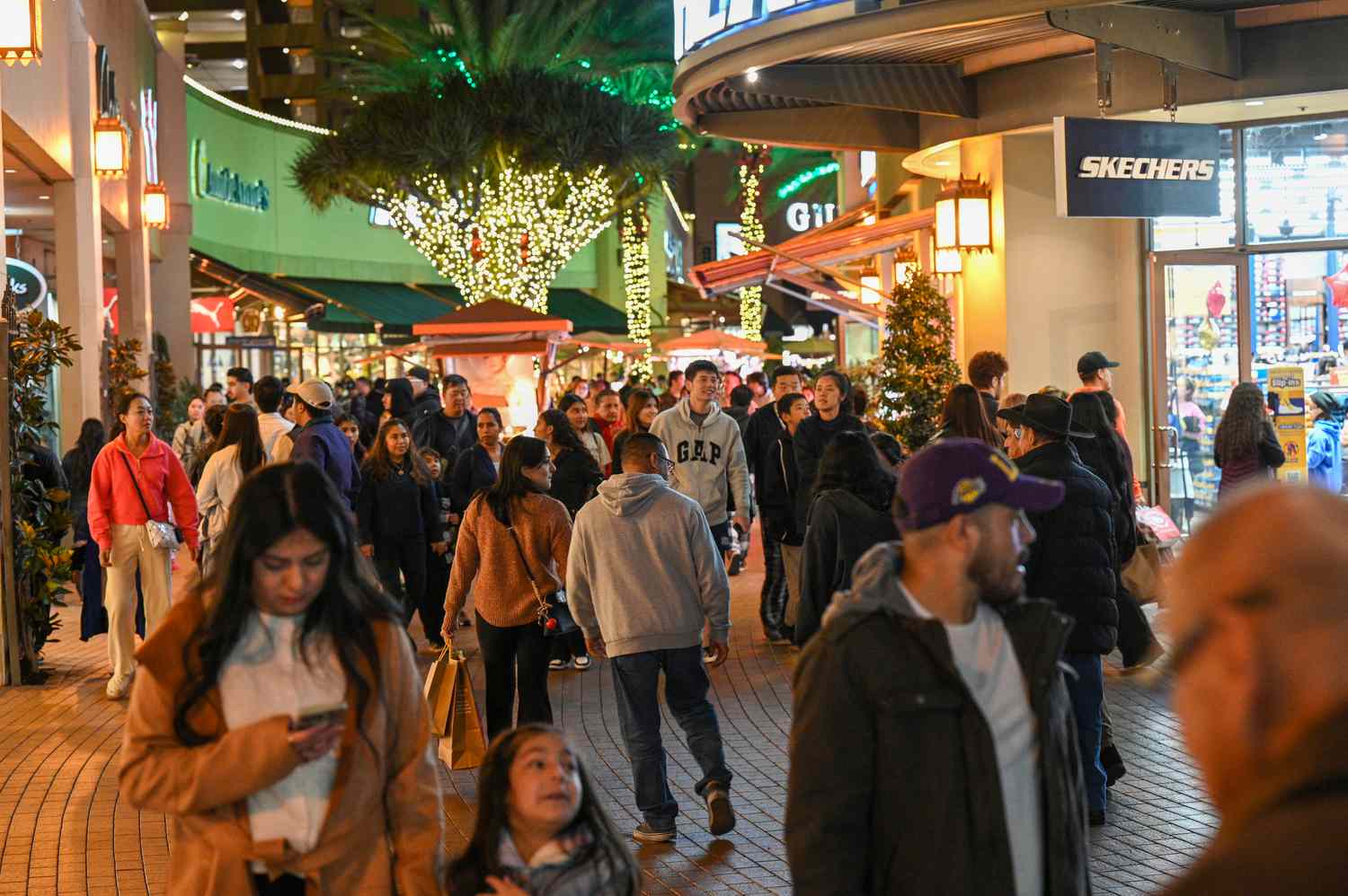 People shop early Black Friday deals on Thanksgiving Day, November 28, 2024, at the Citadel Outlets shopping center in Los Angeles