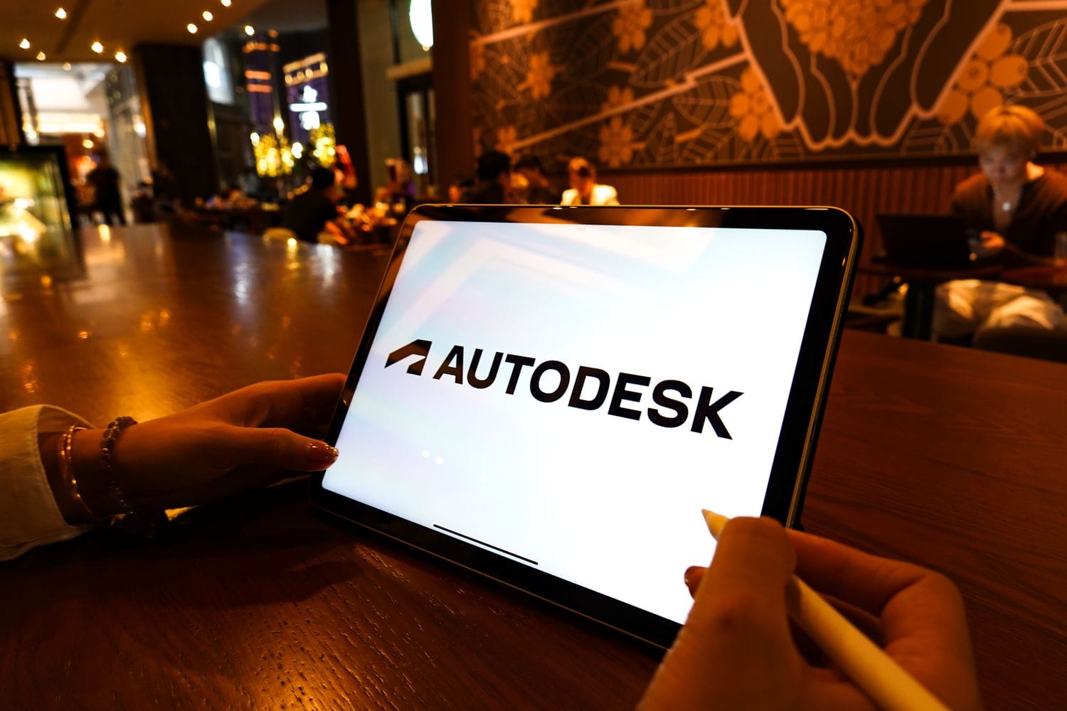 Autodesk logo is displayed on the screen of an iPad