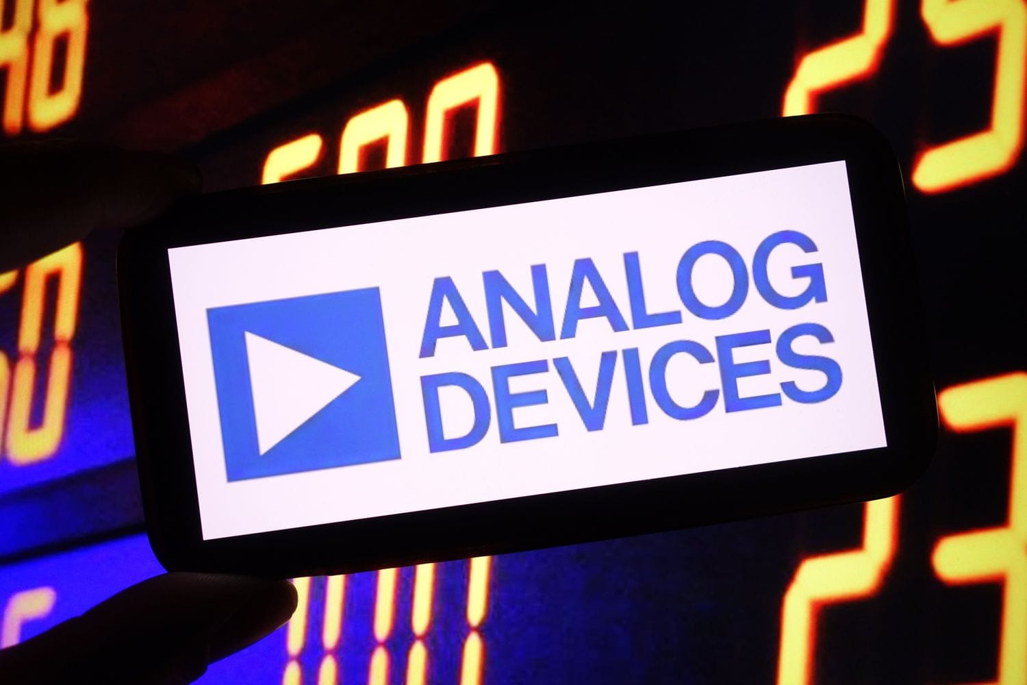 Analog Devices company logo is seen displayed on a smartphone screen