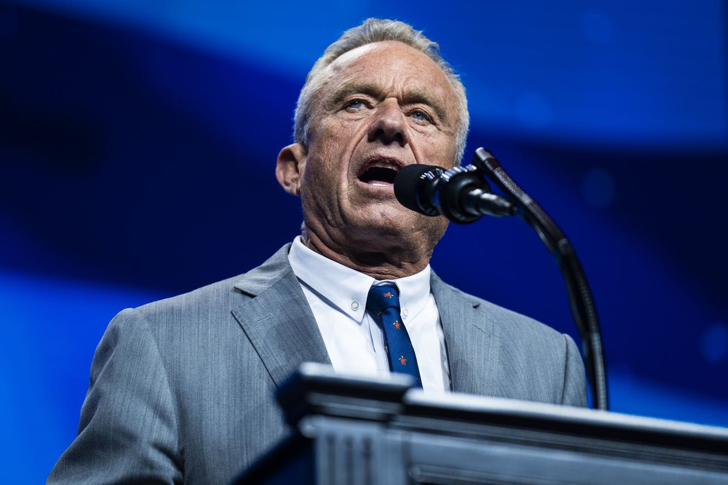 Robert F. Kennedy Jr. speaks with Republican presidential nominee former President Donald Trump at a Turning Point Action Rally in Duluth, GA on Wednesday, Oct. 23, 2024. 