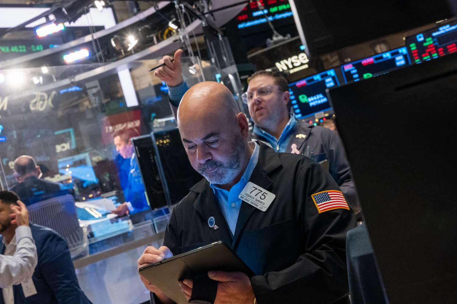 Traders work on the New York Stock Exchange.