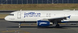 25035f9219a94127d3e97eeeb92e7a61 - Top Stock Movers Now: JetBlue, GM and Salesforce