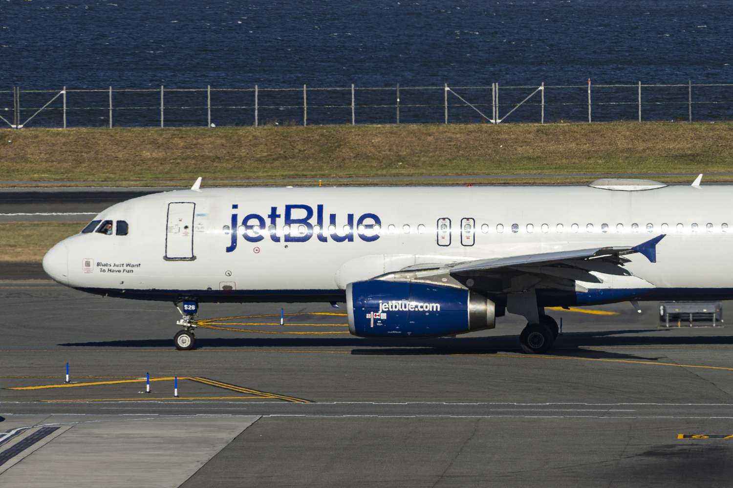 JetBlue Airbus A320-200 passenger aircraft spotted taxiing in LaGuardia airport in New York City