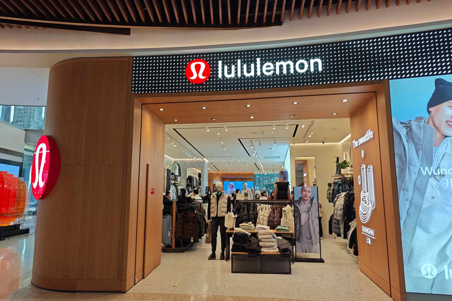 Customers enter a lululemon store in Shanghai, China, November 24, 2024