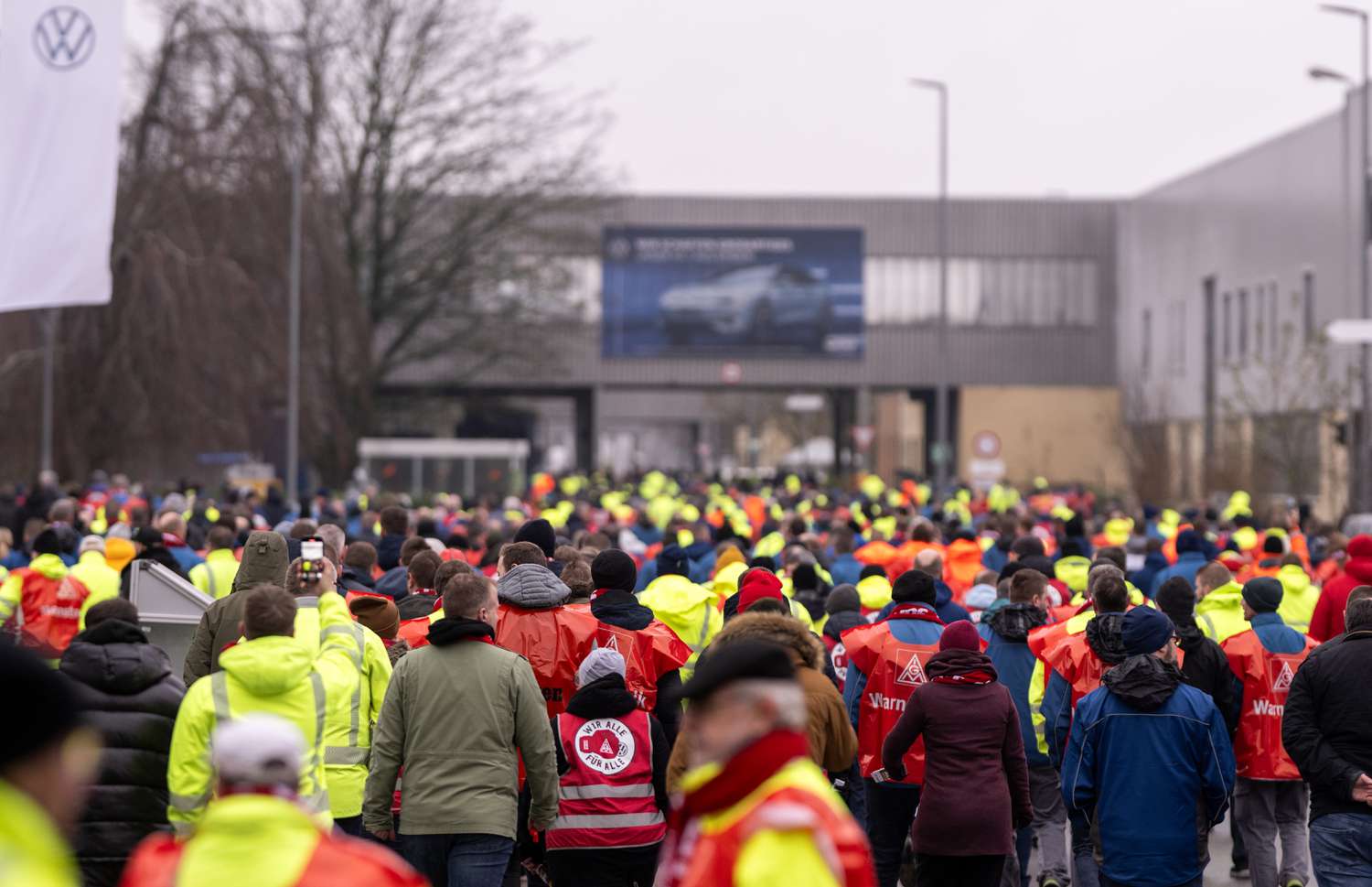 Striking workers walking inside the Volkswagen factory on December 2, 2024 in Emden, Germany