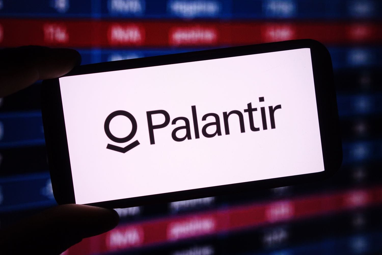 Palantir company logo is seen displayed on a smartphone screen