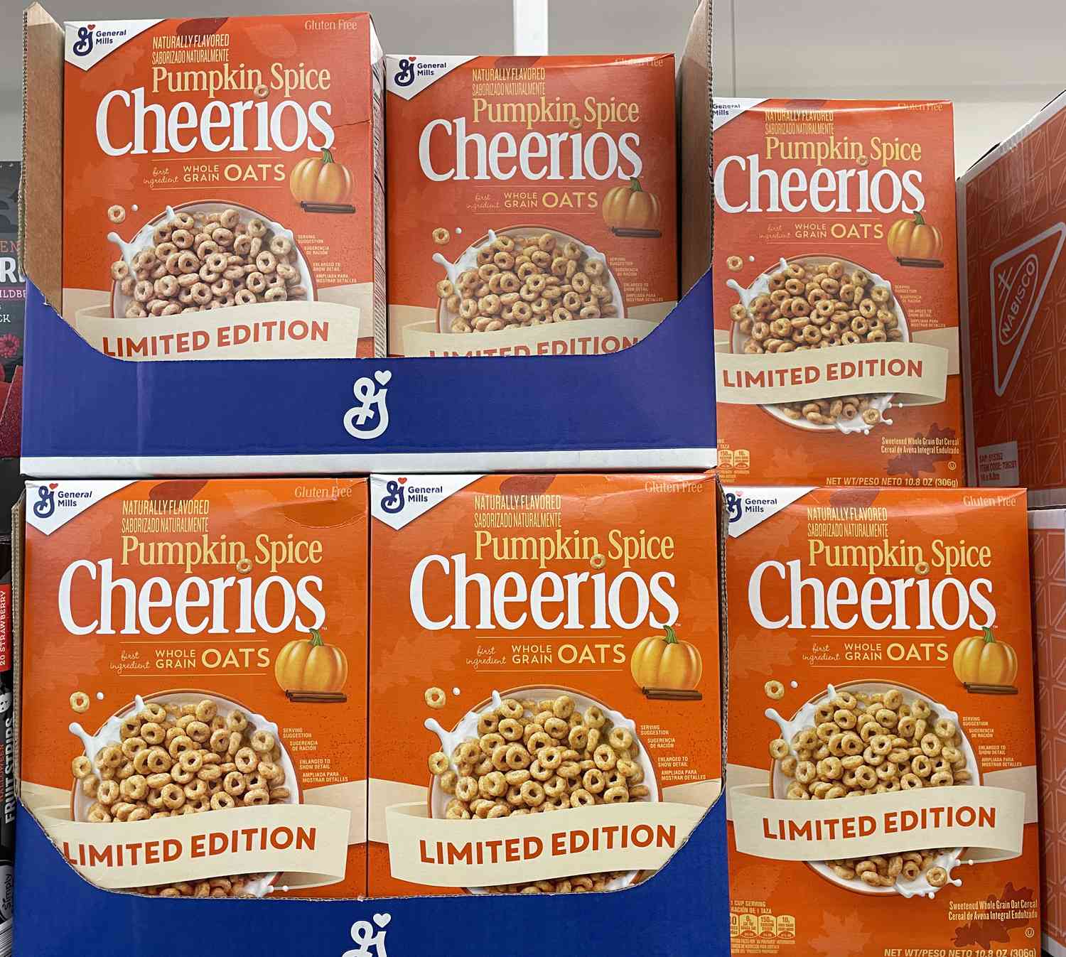 A shelf of orange boxes of Pumpkin Spice Cheerios are seen in a grocery store.