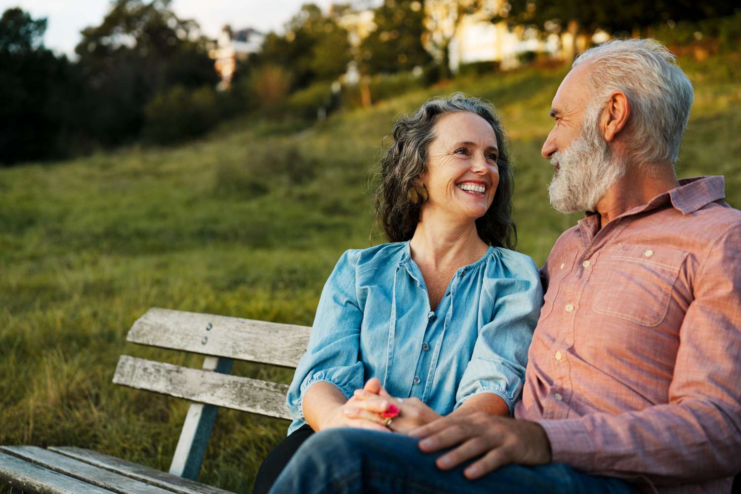 couple sitting on a park bench