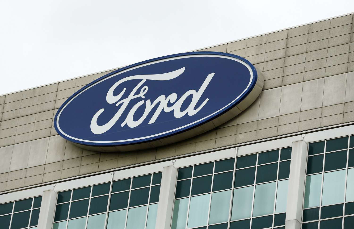 Ford Motor sign on the company's headquarters in Dearborn, Michigan