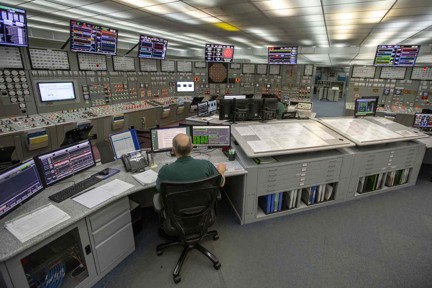 A reactor operator in the control room at the Constellation Nine Mile Point Nuclear Station in Scriba, New York